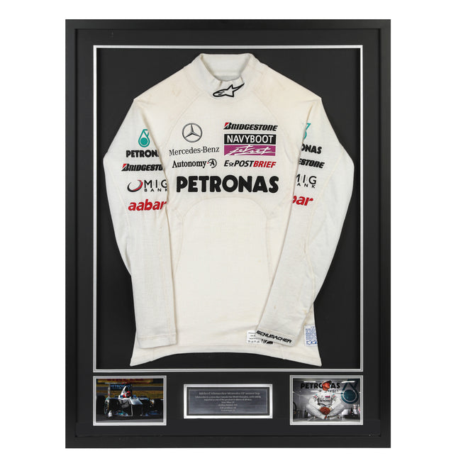 Season Launch LOT 027 - Michael Schumacher 2010 Mercedes Nomex - Framed