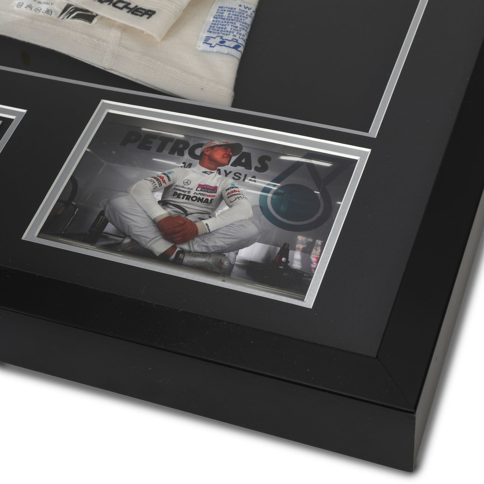 Season Launch LOT 027 - Michael Schumacher 2010 Mercedes Nomex - Framed