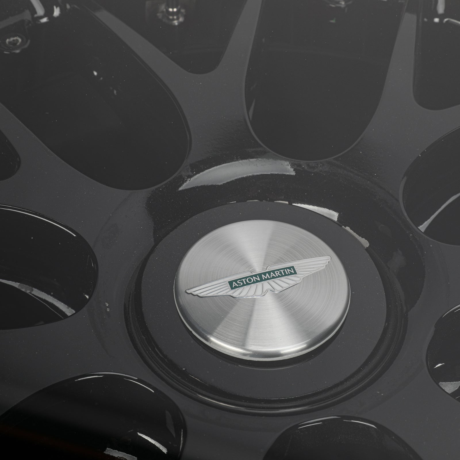 LOT 549 - Aston Martin Aramco Formula One® Team x Movember – Lance Stroll Suit & Wheel Rim