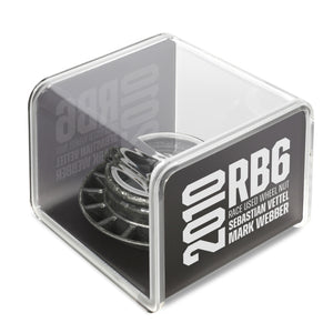 Authentic Red Bull Racing 2010 RB6 Grand Prix-used wheel nut in display case, genuine Formula 1 engineering collectible for collector display