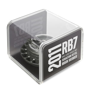 Authentic Red Bull Racing 2011 RB7 Grand Prix-used wheel nut in display case, genuine Formula 1 engineering collectible for collector display