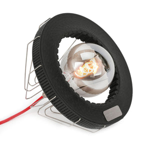 Authentic Alfa Romeo Formula 1 brake disc memorabilia lamp illuminated on desk