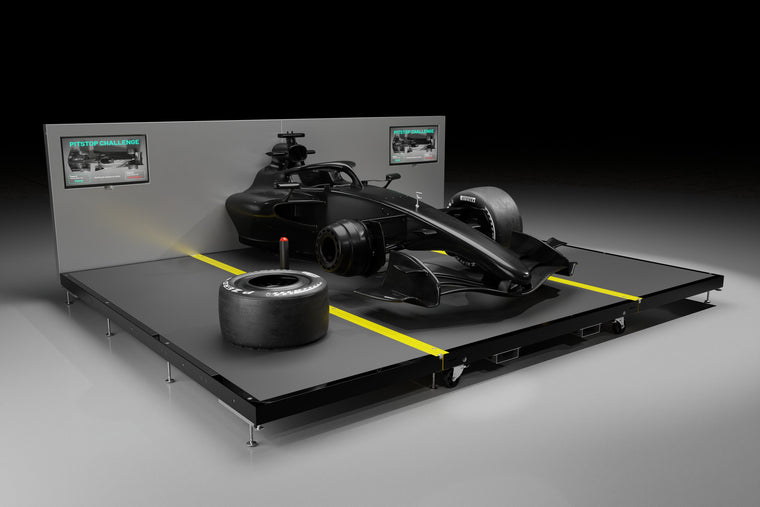 Carbon fibre pit stop rig on a white background