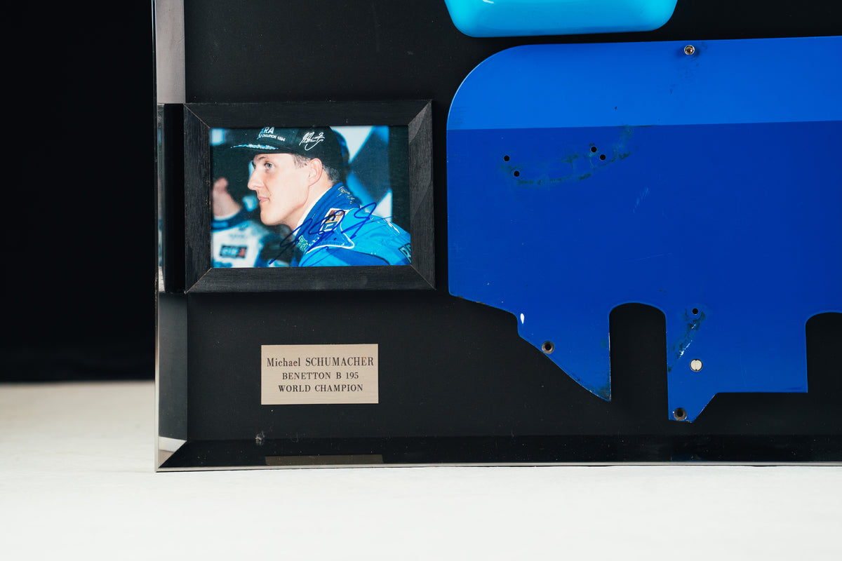 The Austin Auction LOT 024 - Michael Schumacher 1995 Benetton B195 Head Rest & Rear Wing Right-Hand Endplate –  Signed Framed