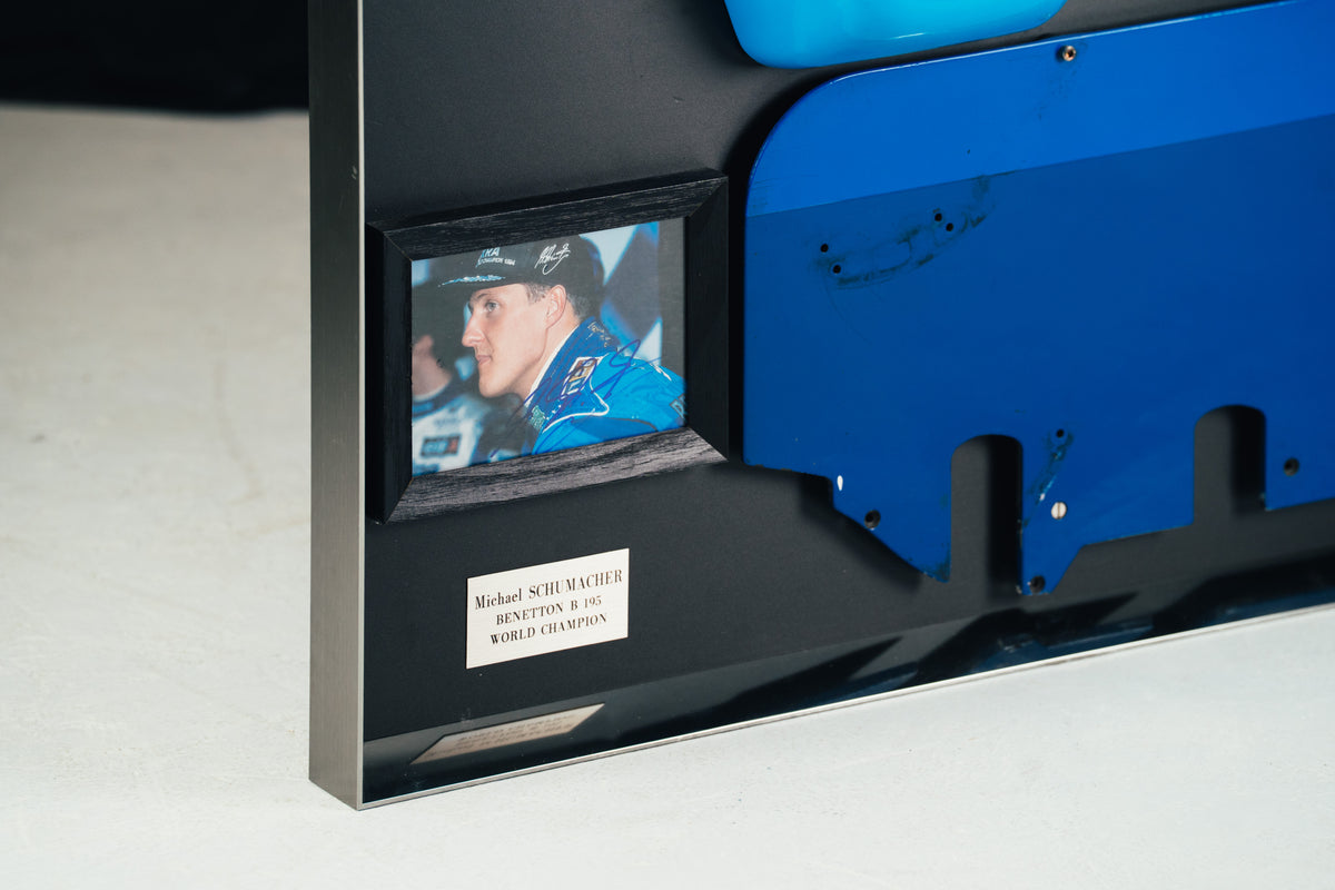 The Austin Auction LOT 024 - Michael Schumacher 1995 Benetton B195 Head Rest & Rear Wing Right-Hand Endplate –  Signed Framed