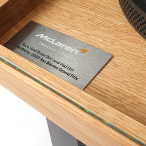 McLaren F1 Team Lando Norris 2022 race-used brake disc and branded brake pad coffee table from the San Marino Grand Prix, premium motorsport furniture