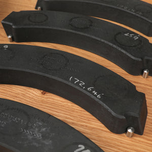 Lando Norris 2022 McLaren F1 Team brake disc and branded brake pad coffee table featuring authentic San Marino Grand Prix-used Formula 1 engineering