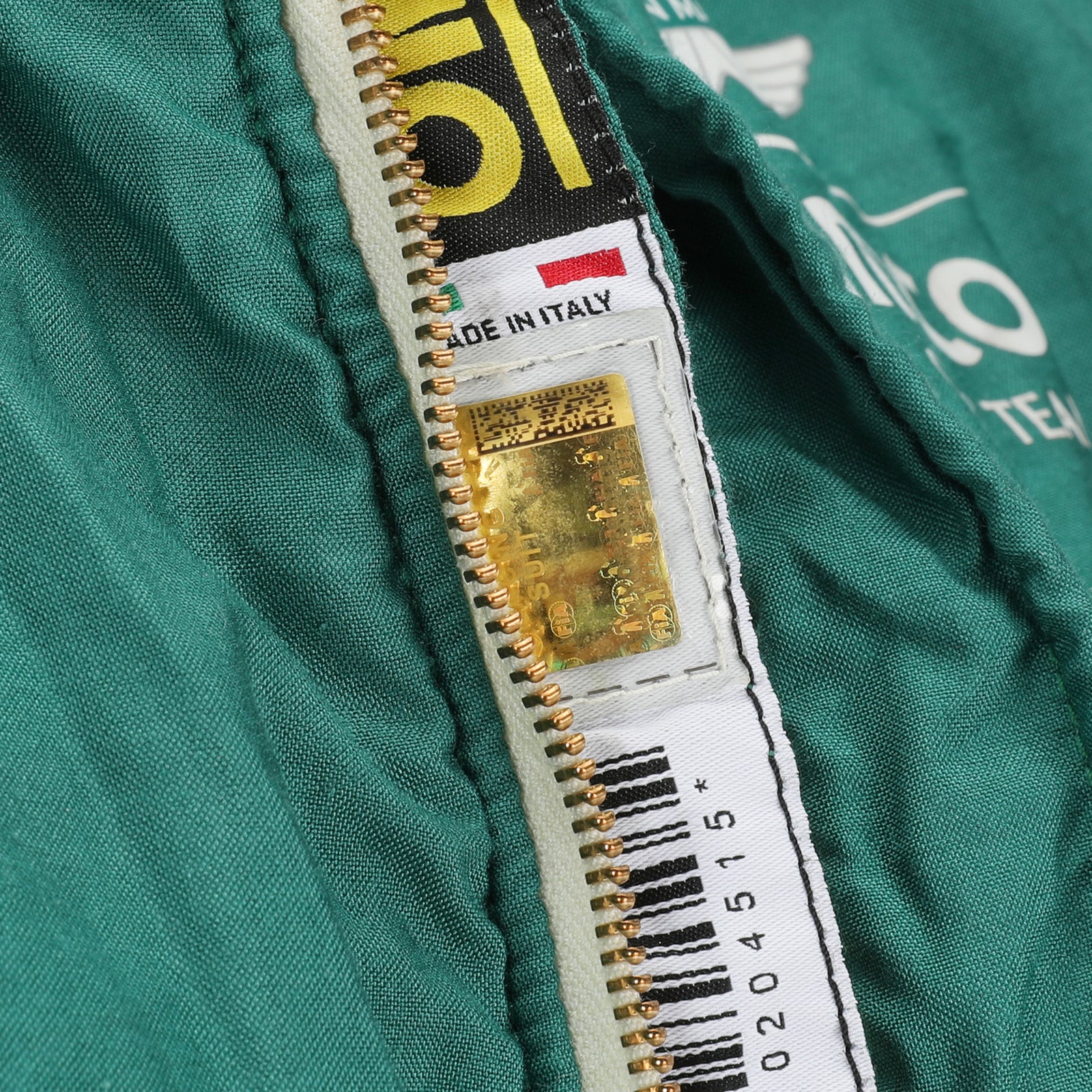 LOT 612 - Fernando Alonso Un-Signed 2024 Aston Martin Aramco Formula One Team Grand Prix Used Suit