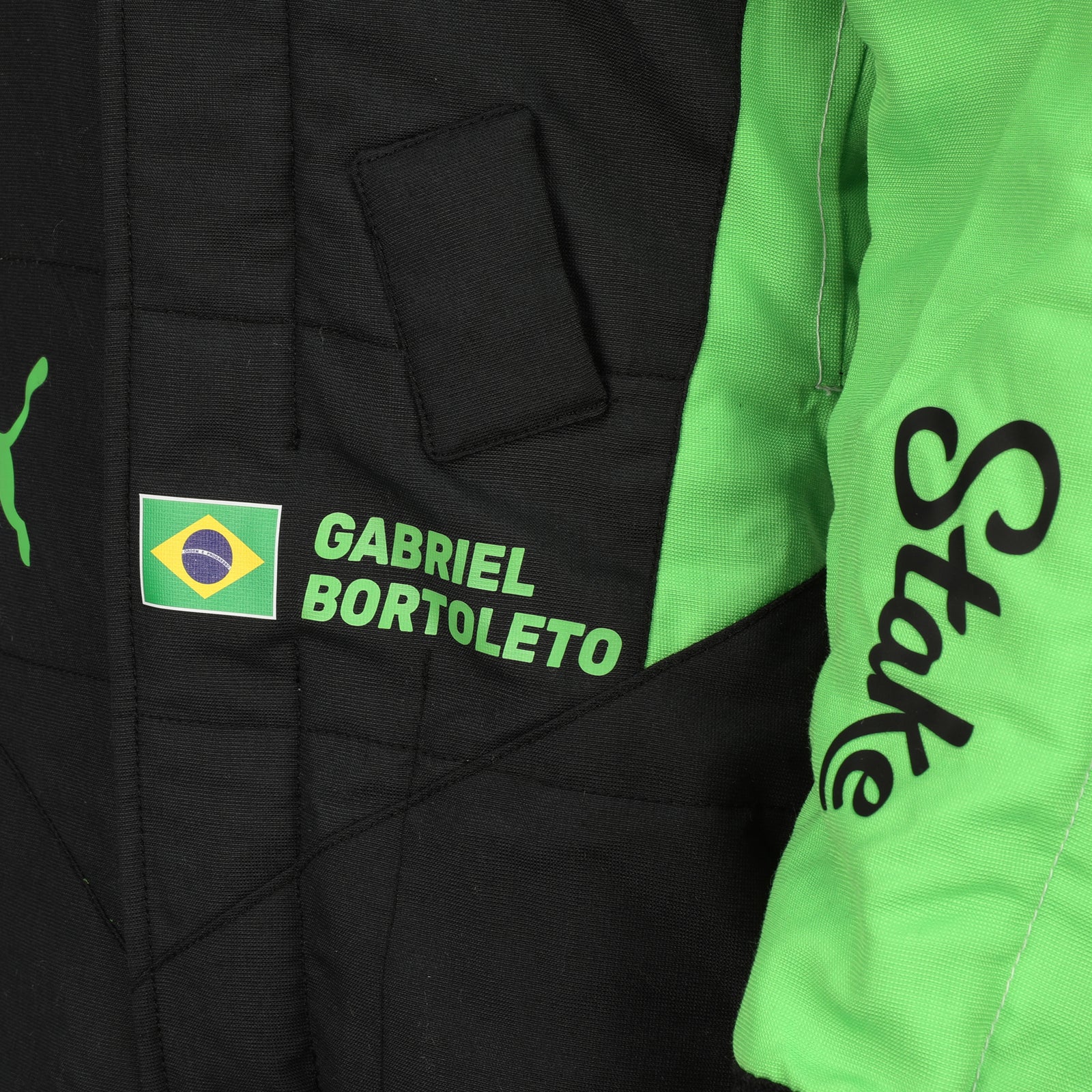 LOT 634 - Gabriel Bortoleto Signed 2025 Grand Prix Used Stake F1 Team Kick Sauber Race Suit