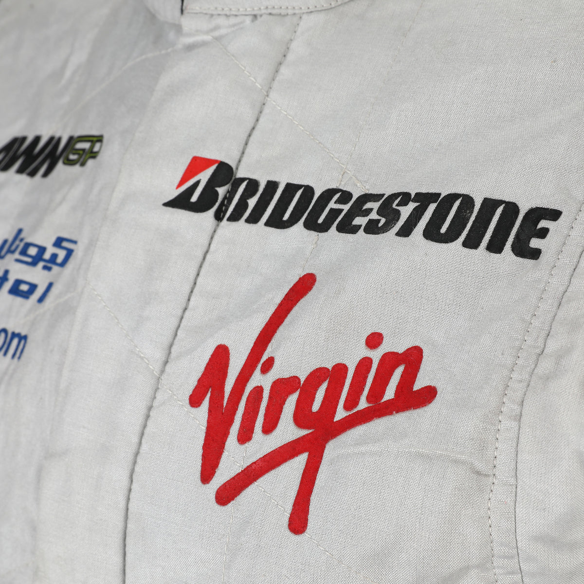LOT 002 - Jenson Button 2009 Brawn GP Abu Dhabi Grand Prix Weekend-Used Race Suit