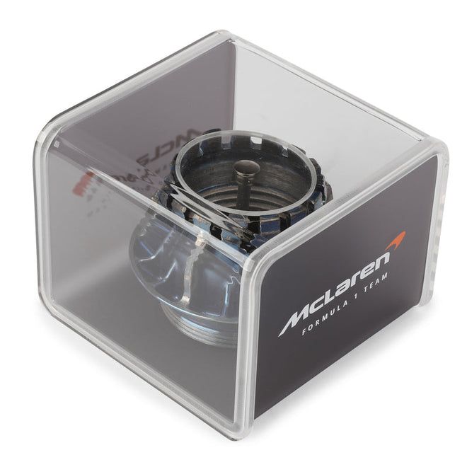 LOT 258 - McLaren 2022 Race-Used Wheel Nut in Display Case - Blue