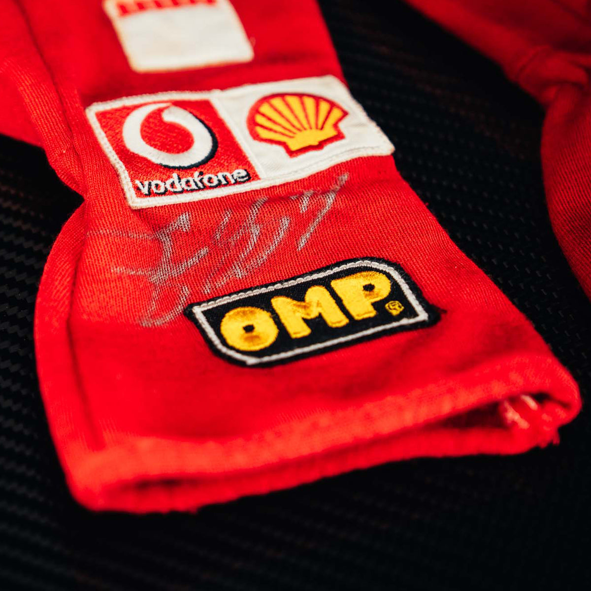 The Austin Auction LOT 045 - Michael Schumacher 2005 Scuderia Ferrari Signed OMP Racing Gloves