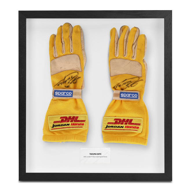 The Austin Auction LOT 041 - Takuma Sato 2002 Jordan F1 Team Signed Race Used Gloves