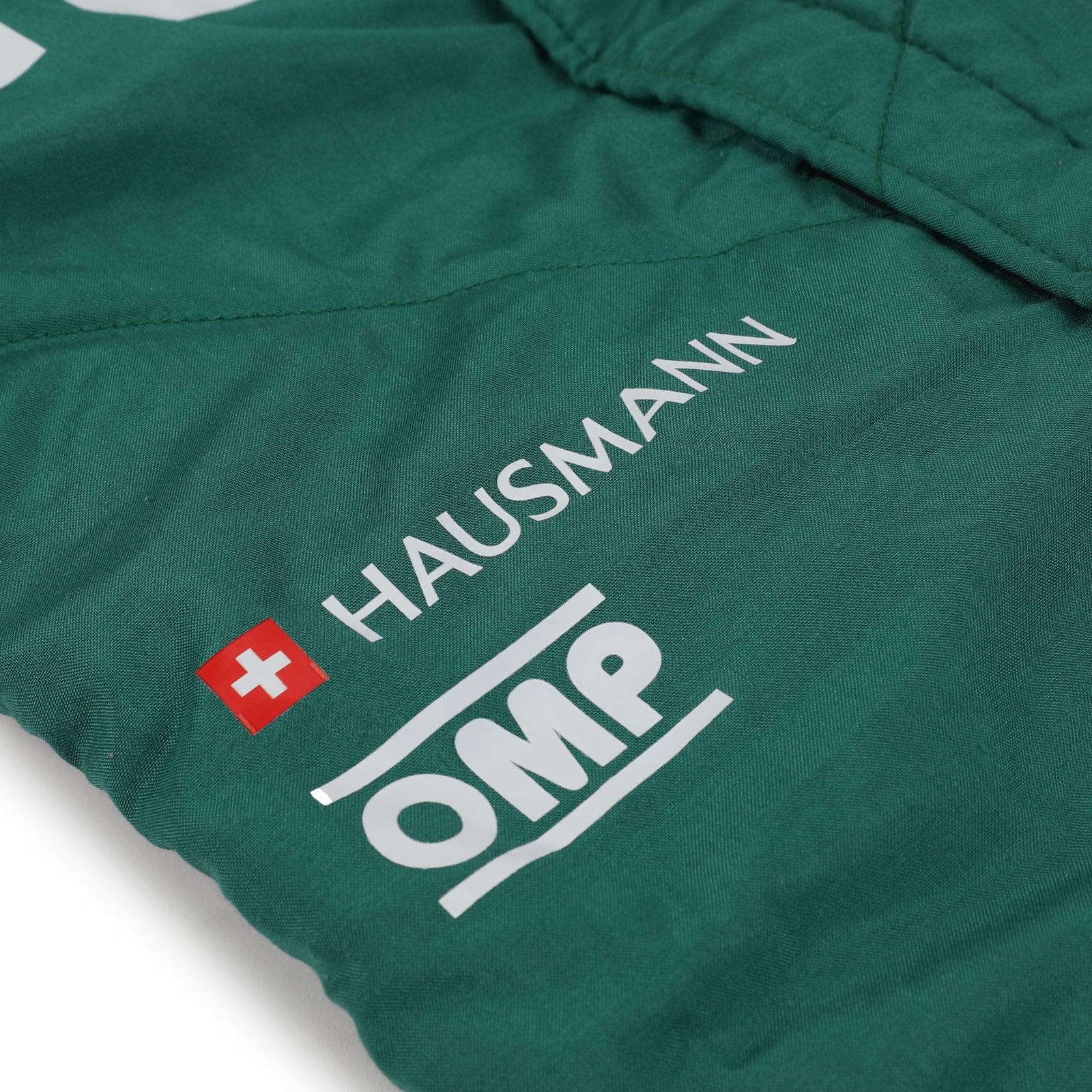 LOT 034 - Tina Hausmann Un-Signed Un-Used Aston Martin Aramco F1 Team 2024 Season Suit