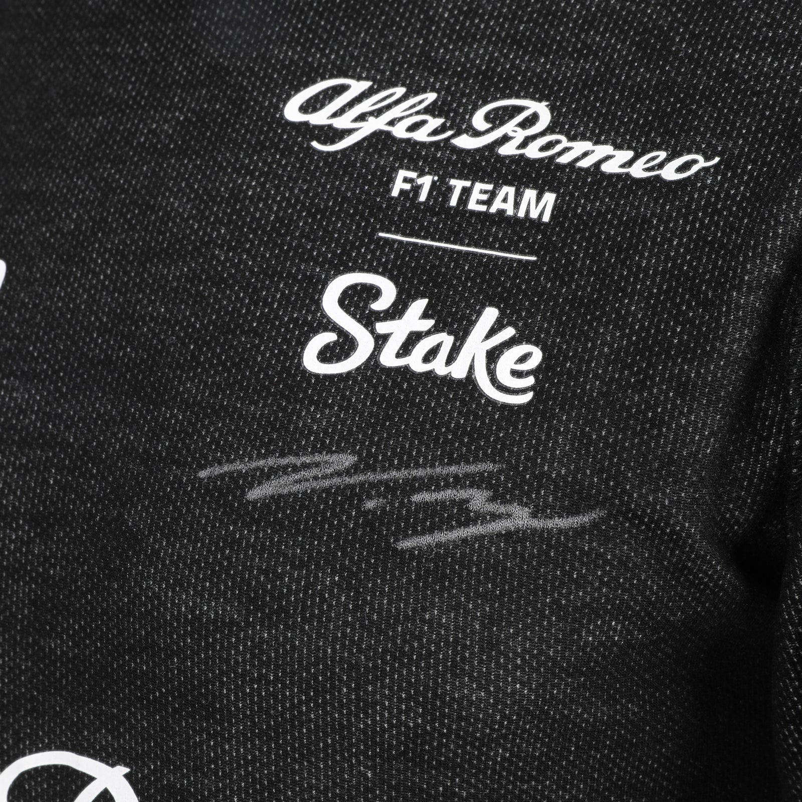 LOT 657 - Valtteri Bottas 2023 Season Signed Alfa Romeo F1 Team KICK Race Spec Nomex Top