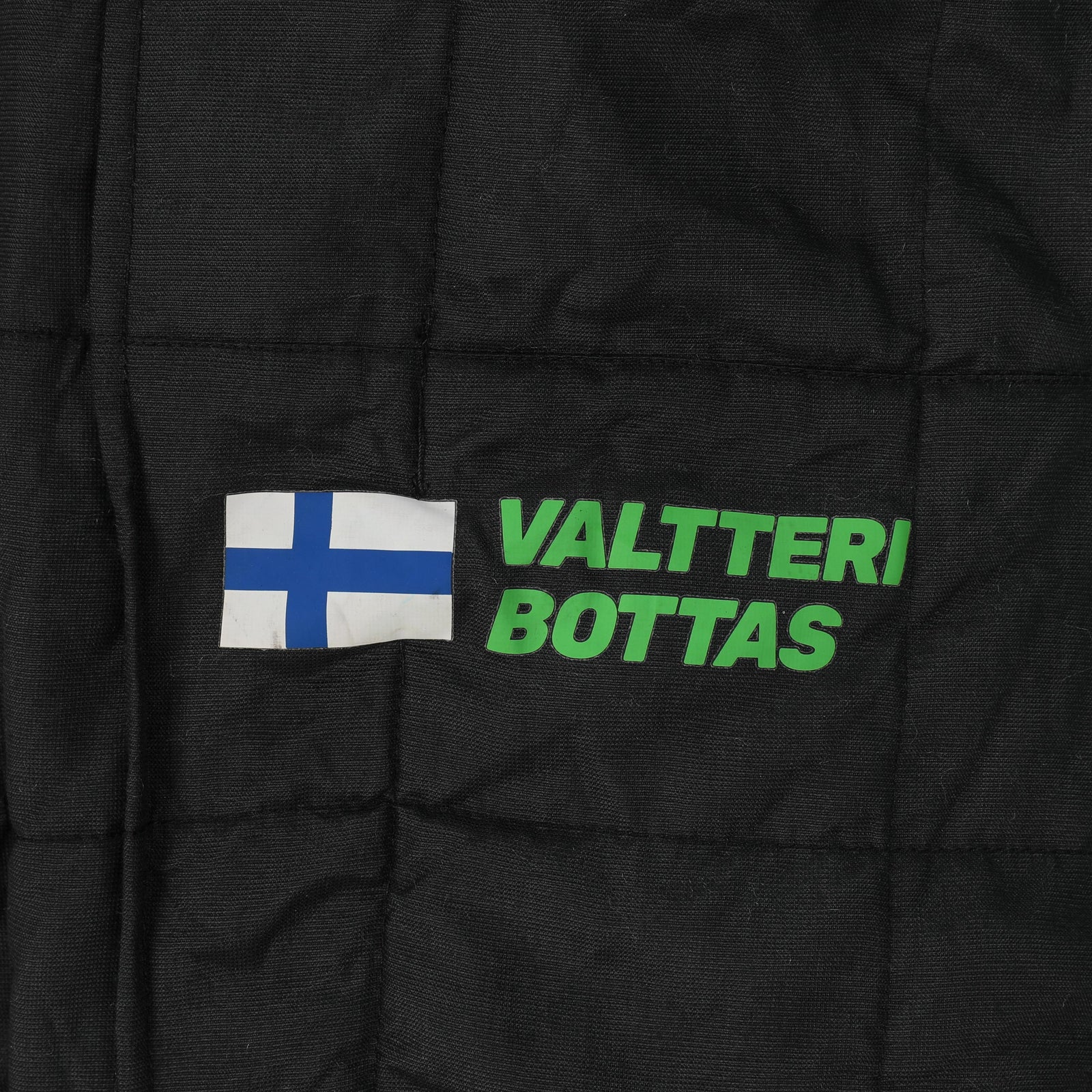 The Silverstone Auction LOT 010 - Valtteri Bottas Signed 2024 Stake F1 Team Kick Sauber Grand Prix Used Race Suit - British GP