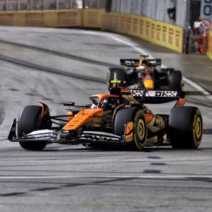 Lando Norris 2024 McLaren Formula 1 Team rear wheel rim table featuring a genuine Singapore Grand Prix-used Formula 1 component