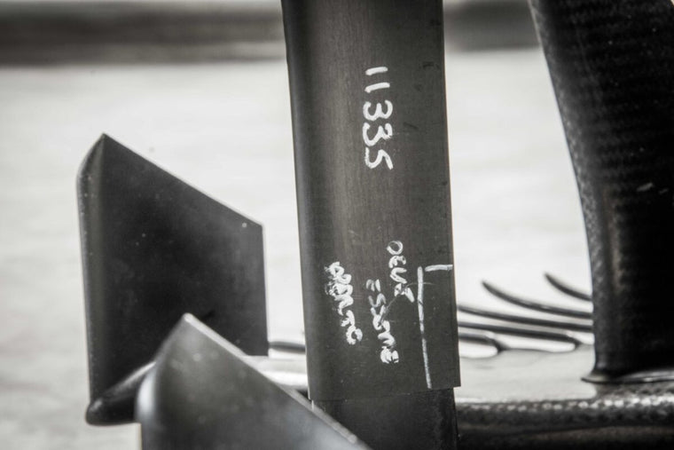 Toro Rosso STR14-04 rolling chassis with P2 finish from the 2019 Formula 1 season, authentic collector display